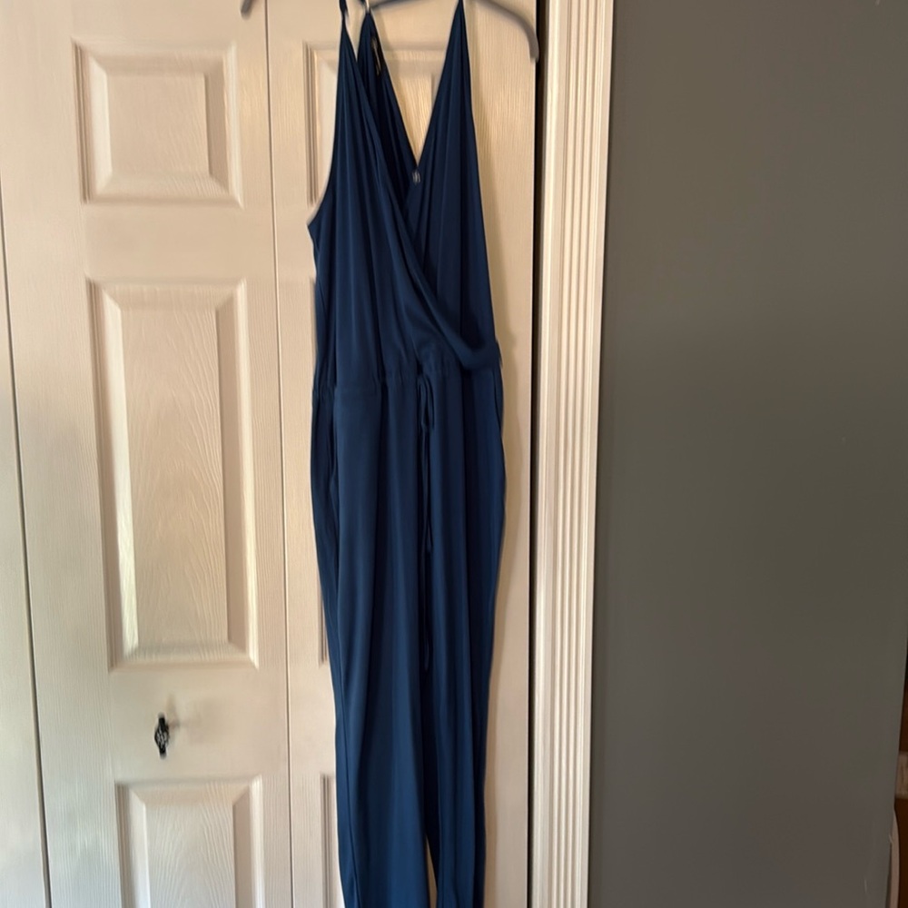 Brand new blue racer back jumpsuit